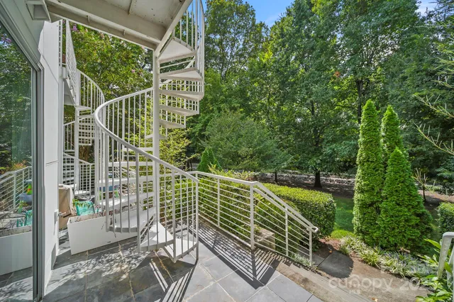 a view of balcony with wooden floor