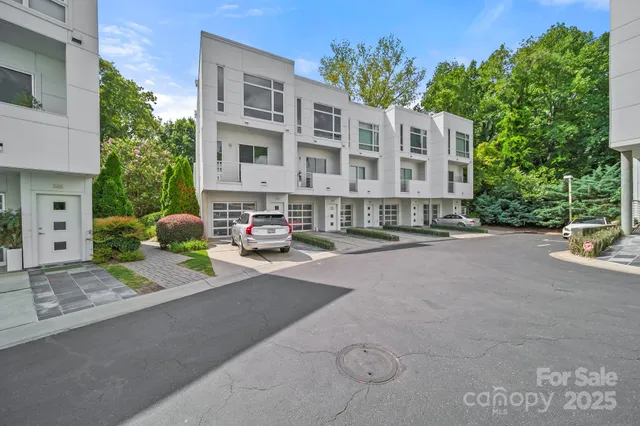 a car parked in front of brick building