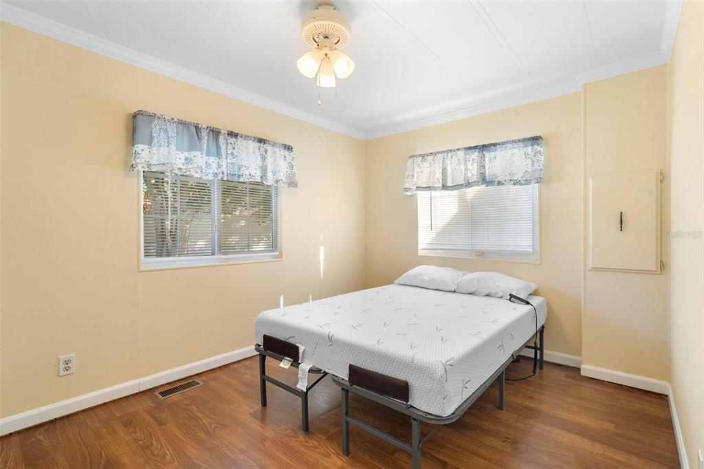 105 Florence Boulevard DeBary, FL 32713 - Photo 14 of 31 a bedroom with a bed and a window