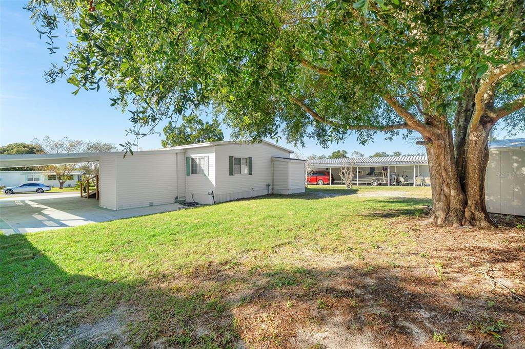 105 Florence Boulevard DeBary, FL 32713 - Photo 19 of 31 a house view with a garden space