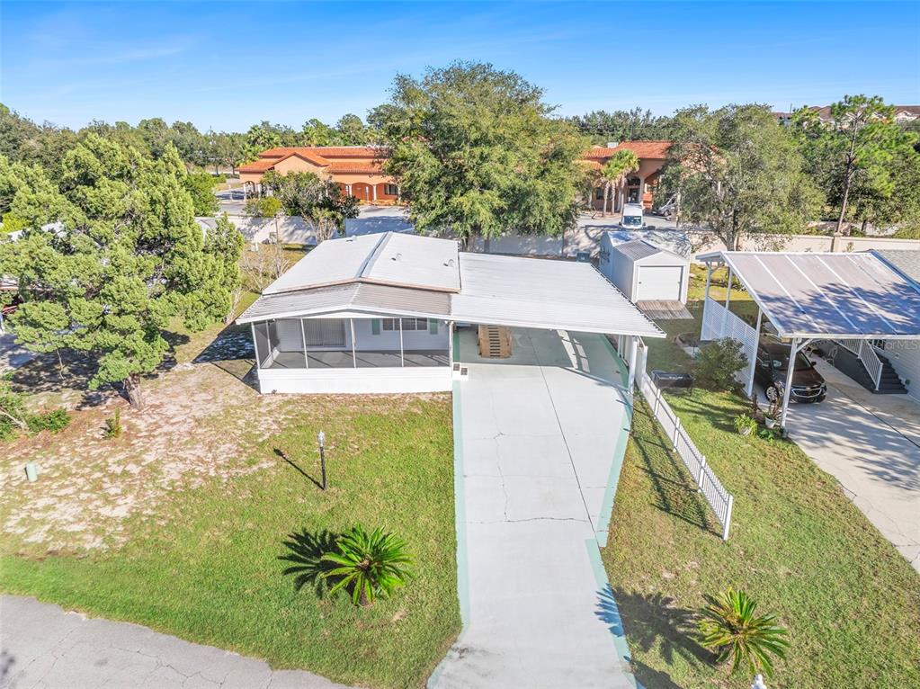 105 Florence Boulevard DeBary, FL 32713 - Photo 23 of 31 a view of a house with a swimming pool