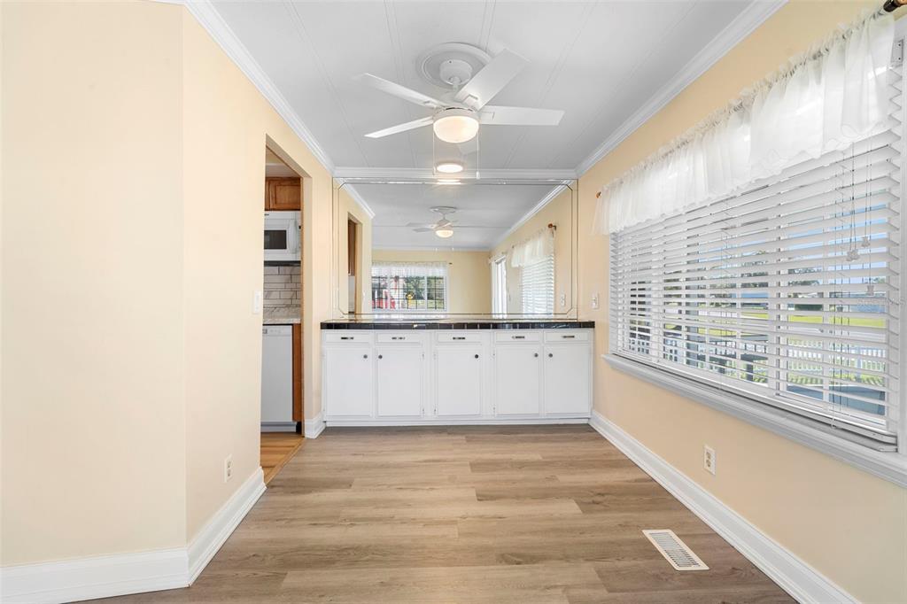 105 Florence Boulevard DeBary, FL 32713 - Photo 6 of 31 a view of a kitchen with a sink and cabinets