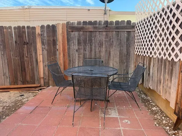 a view of outdoor space with furniture