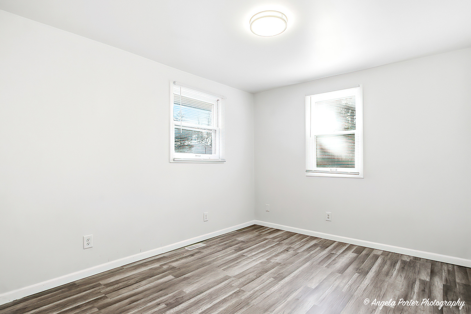 24676 West Clinton Avenue Round Lake, IL 60073 - Photo 15 of 28 an empty room with a window