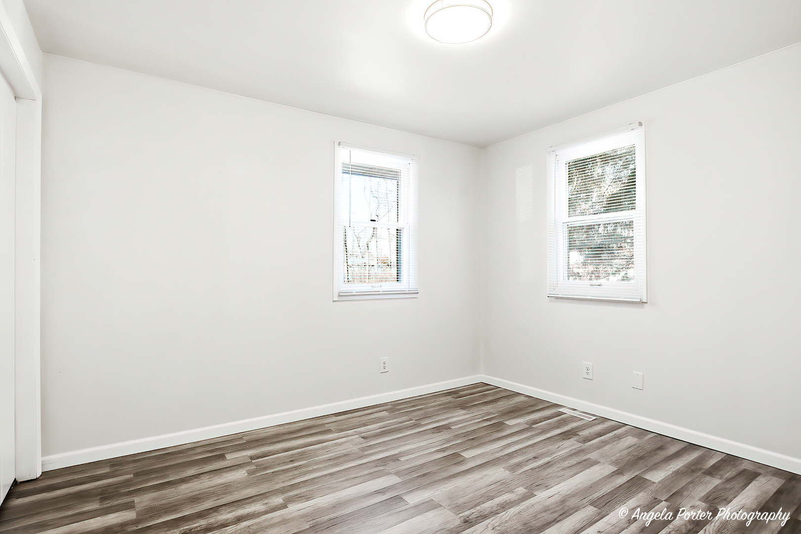 24676 West Clinton Avenue Round Lake, IL 60073 - Photo 17 of 28 an empty room with a window