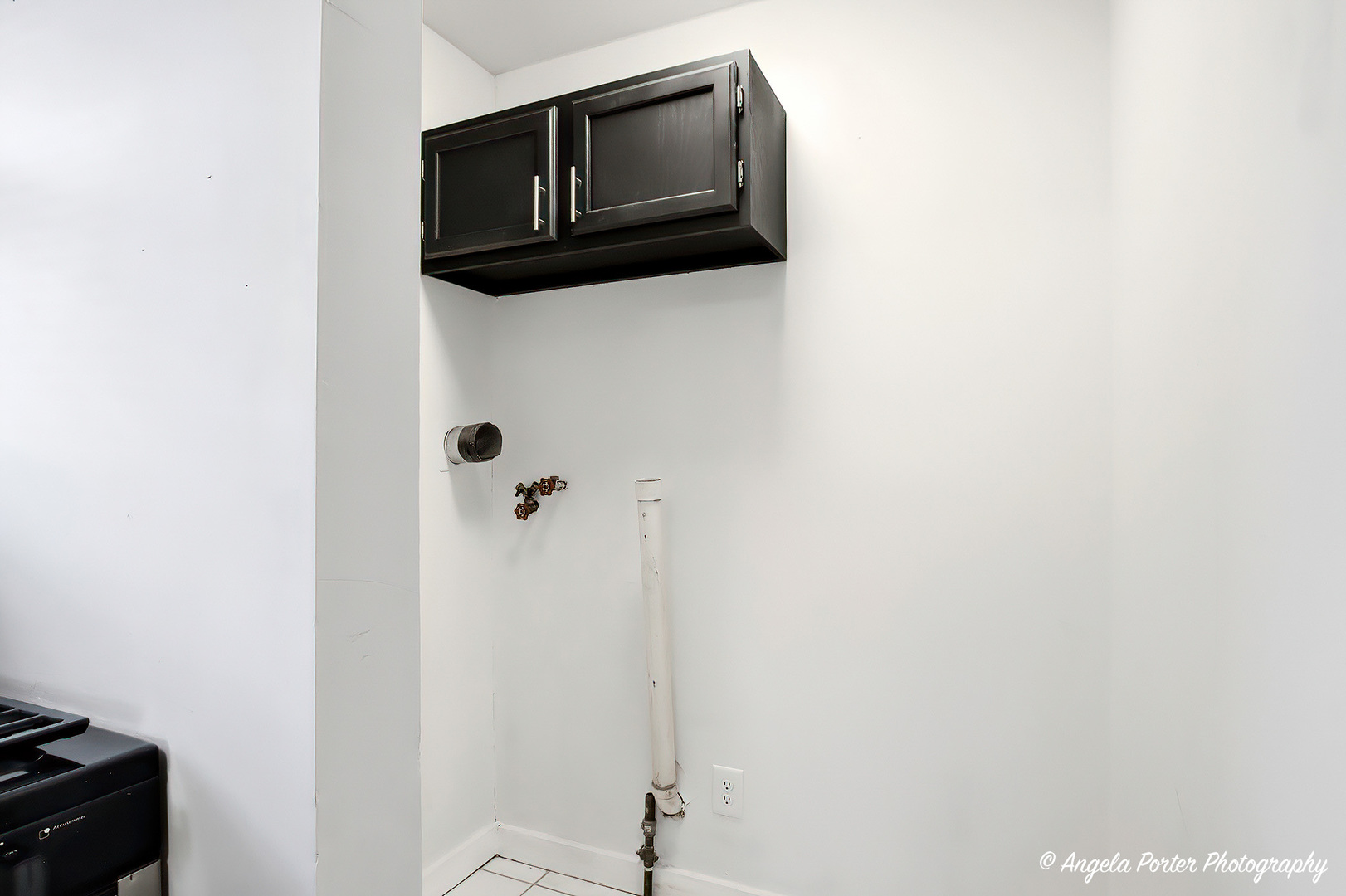 24676 West Clinton Avenue Round Lake, IL 60073 - Photo 19 of 28 a picture of a wall with a microwave