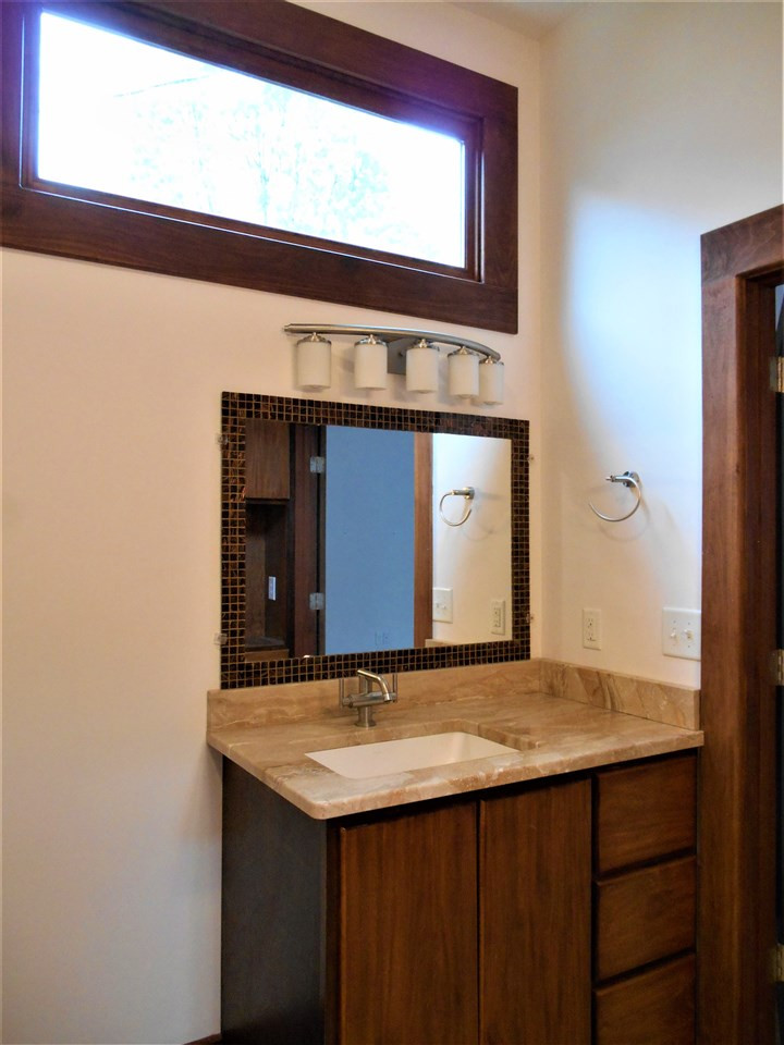 515 Euclid Street Raleigh, NC 27604 - Photo 12 of 24 Marble tops and simple, elegant fixtures. Master bath tall vanity