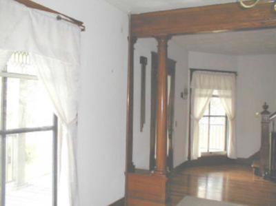 969 Co Rte 16 Beaver Dams, NY 14812 - Photo 4 of 8 View from parlor into entrance way. Notice the flo