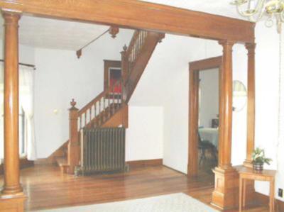 969 Co Rte 16 Beaver Dams, NY 14812 - Photo 6 of 8 Another view from parlor showing formal staircase.