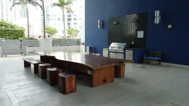 a kitchen with a stove and a table