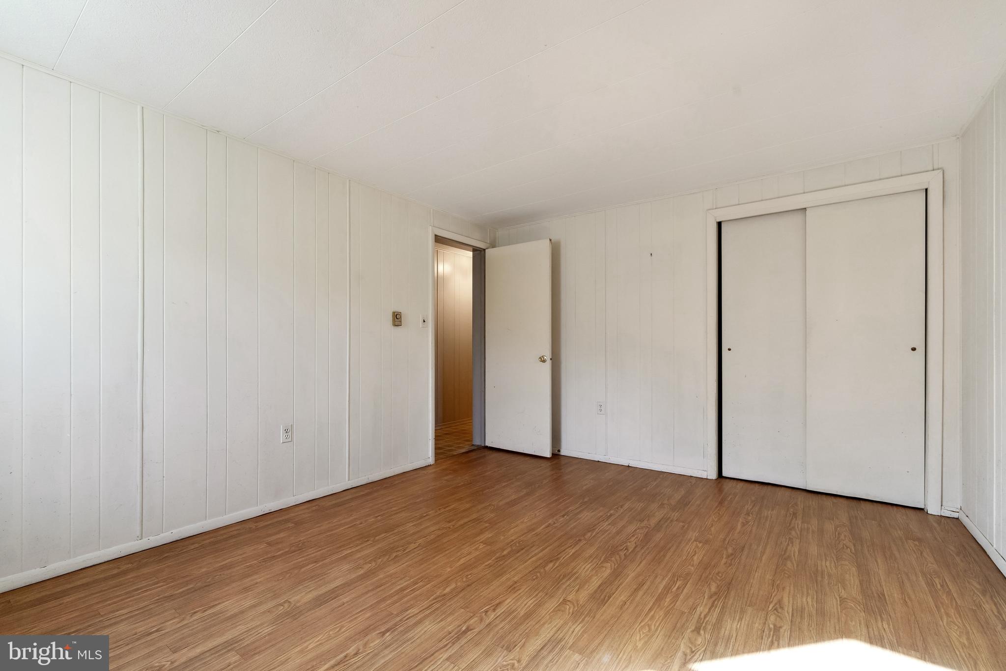 1106 Round Top Road Chestertown, MD 21620 - Photo 15 of 27 a view of an empty room and wooden floor