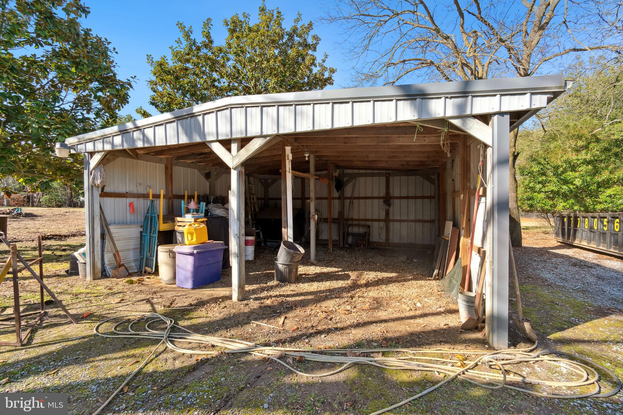 1106 Round Top Road Chestertown, MD 21620 - Photo 21 of 27 a view of a house with tub and trees