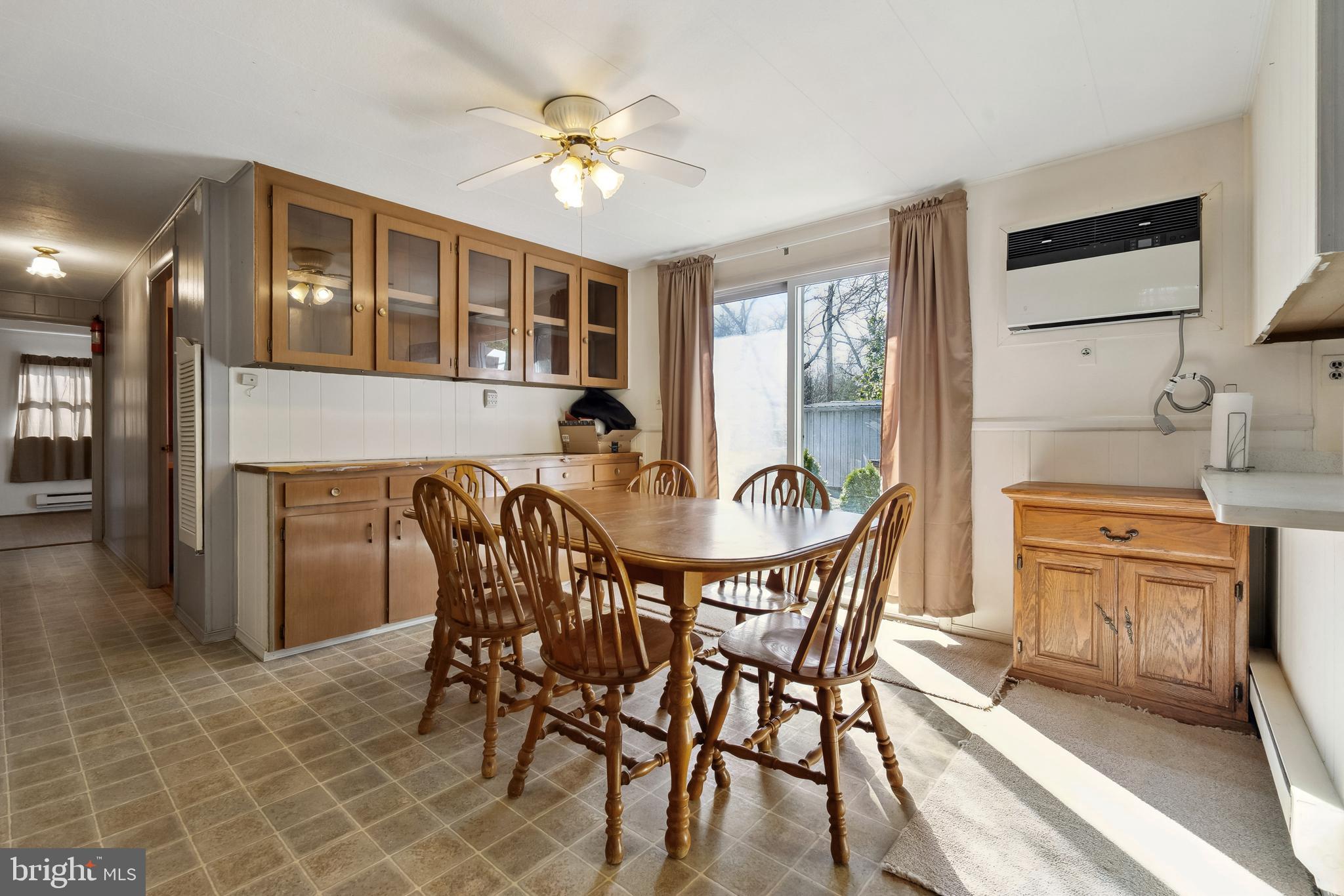1106 Round Top Road Chestertown, MD 21620 - Photo 7 of 27 a view of a dining room with furniture window and outside view