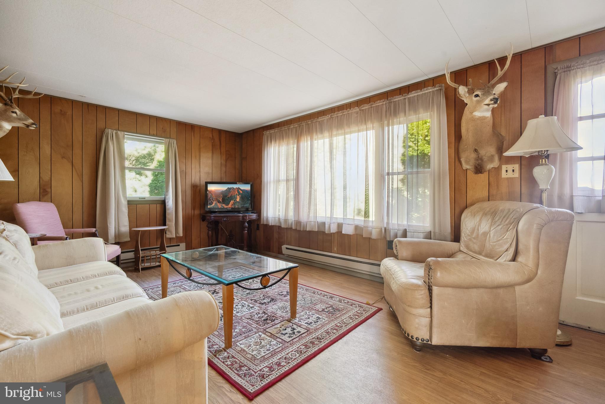 1106 Round Top Road Chestertown, MD 21620 - Photo 9 of 27 a living room with furniture and a large window