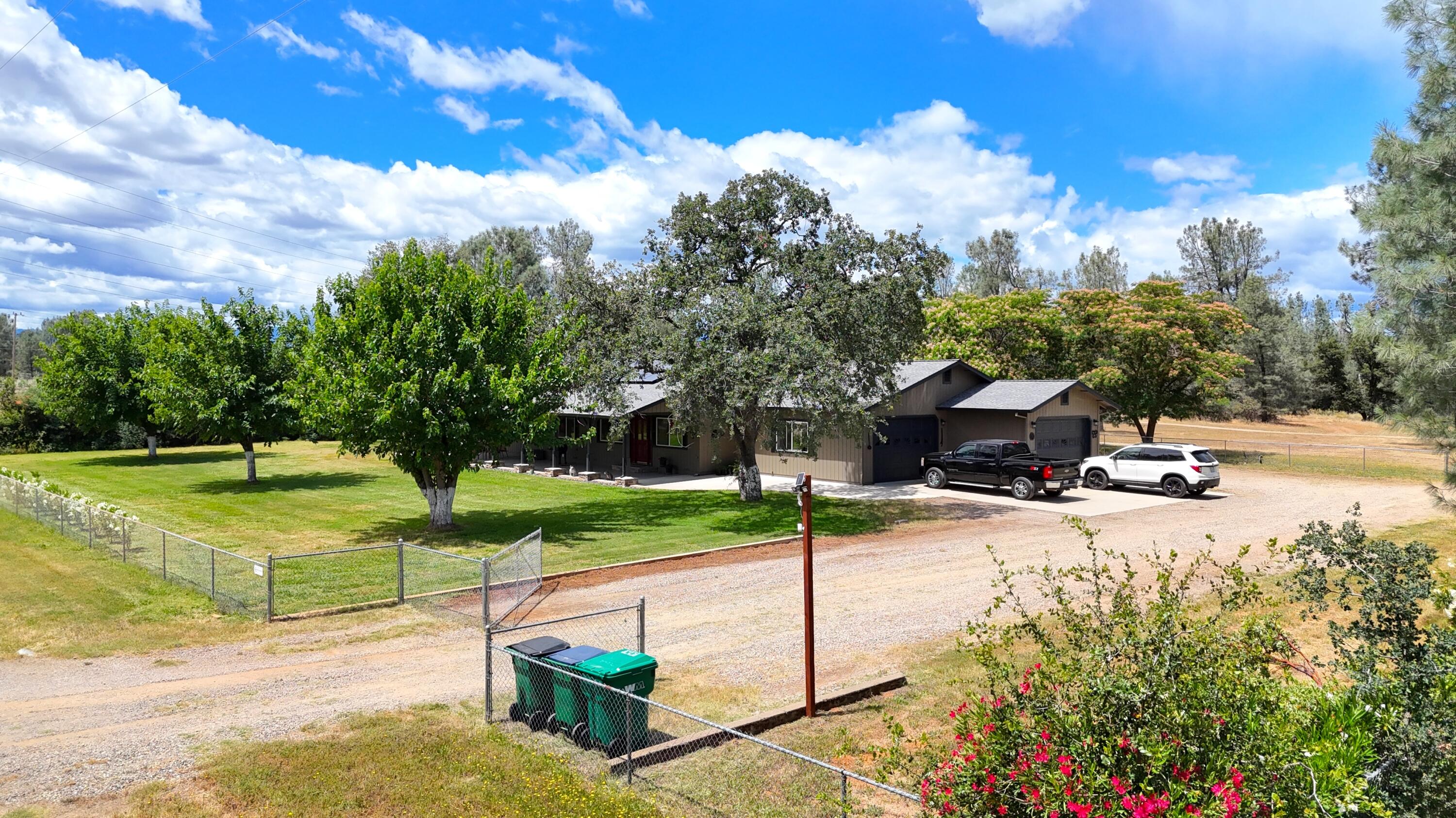 17536 Oly Way Anderson, CA 96007 - Photo 6 of 51 a view of a house with backyard and porch