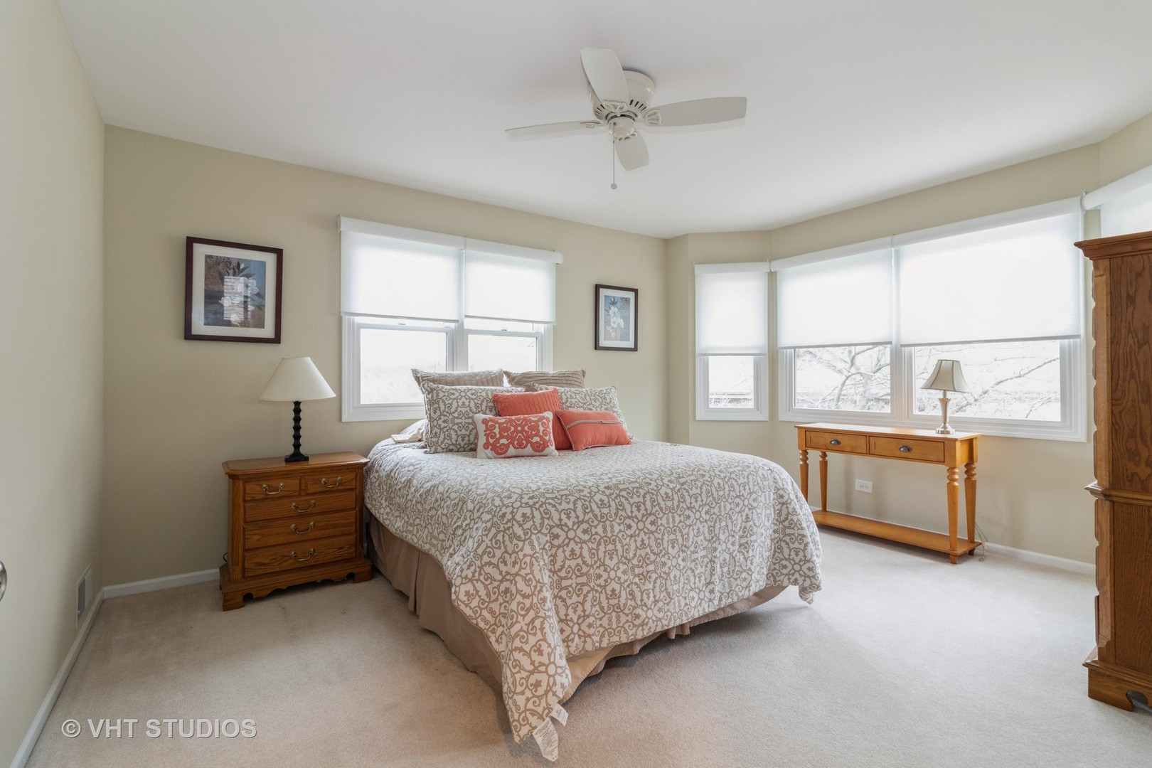 14520 Lake Ridge Road Orland Park, IL 60462 - Photo 12 of 16 a bedroom with a large bed and a window