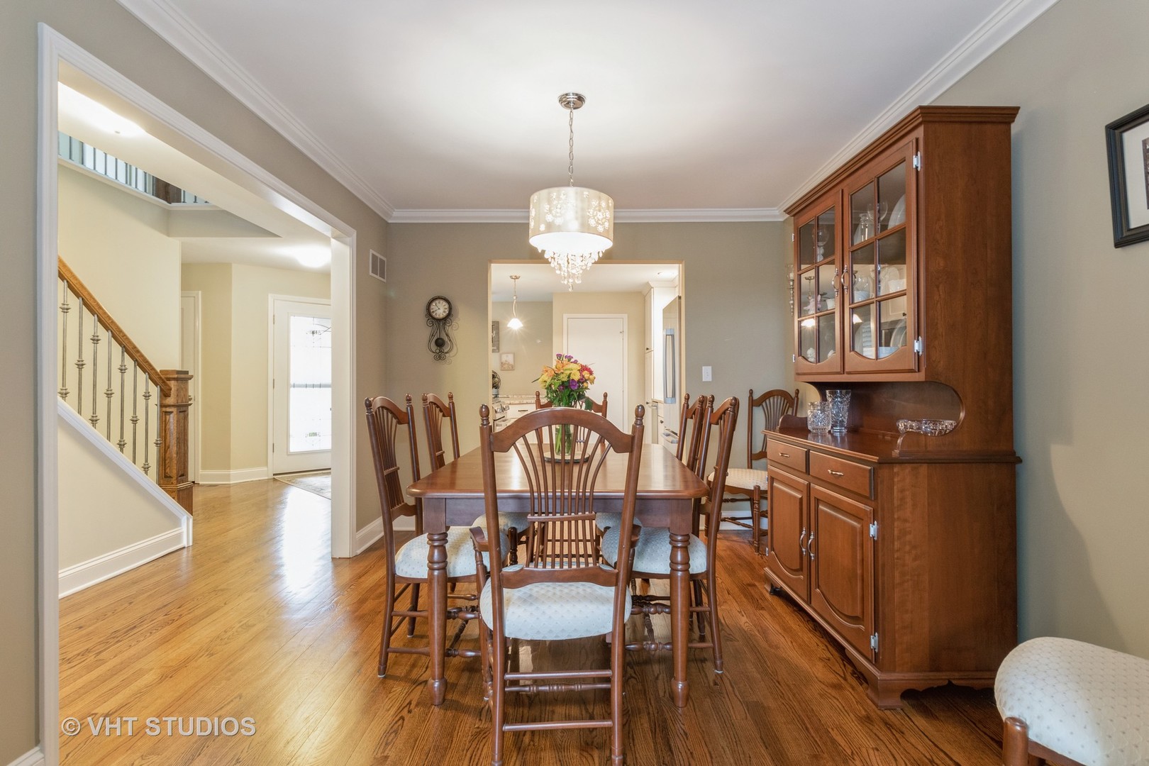 14520 Lake Ridge Road Orland Park, IL 60462 - Photo 7 of 16 a view of a dining room with furniture window and wooden floor