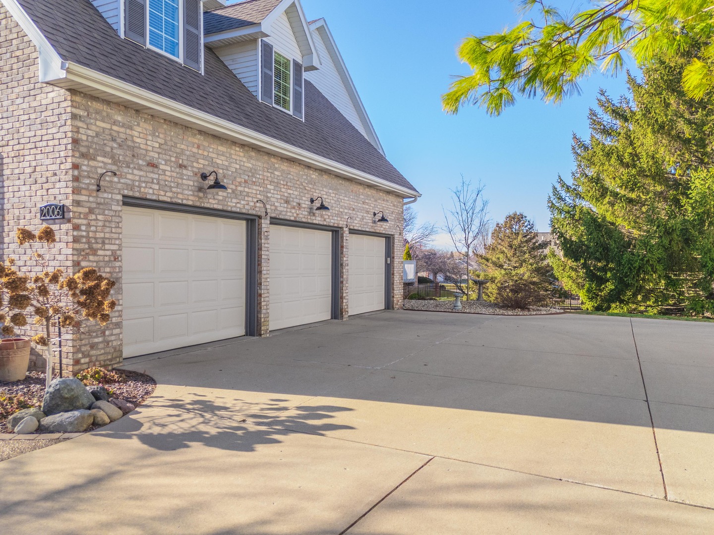 2006 Woodbine Road Bloomington, IL 61704 - Photo 11 of 98 a front view of a house with a garage