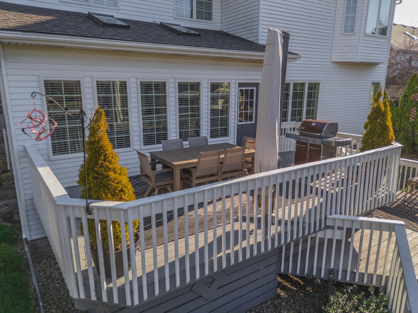 2006 Woodbine Road Bloomington, IL 61704 - Photo 16 of 98 a view of a brick house with large windows