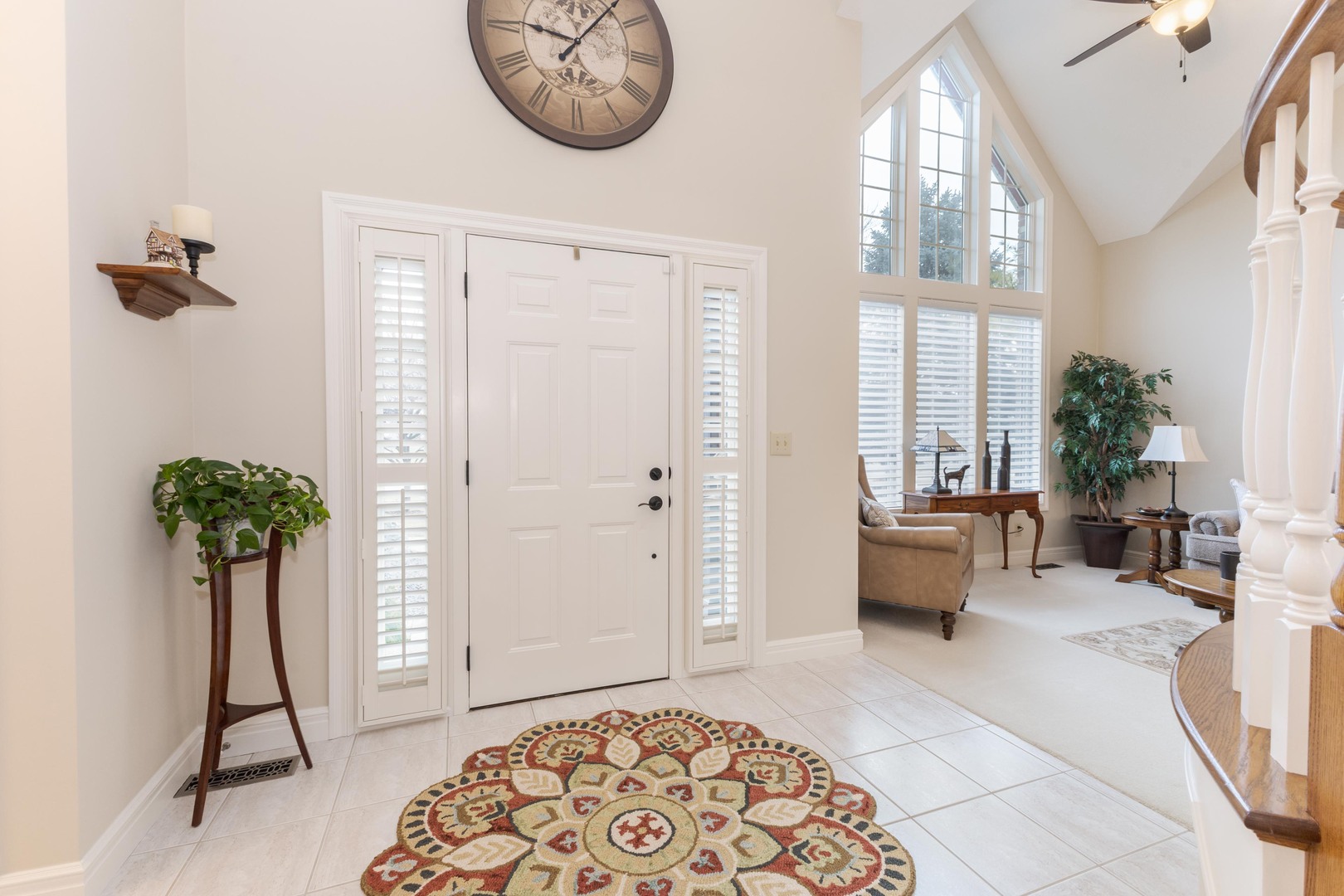 2006 Woodbine Road Bloomington, IL 61704 - Photo 20 of 98 a living room with furniture and a potted plant