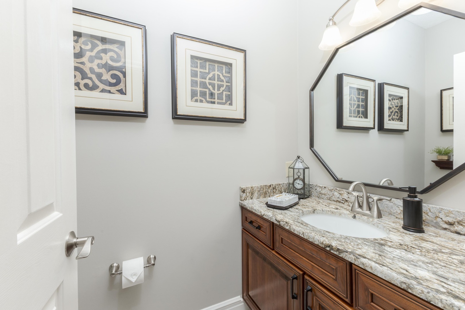 2006 Woodbine Road Bloomington, IL 61704 - Photo 23 of 98 a bathroom with a granite countertop sink and a mirror