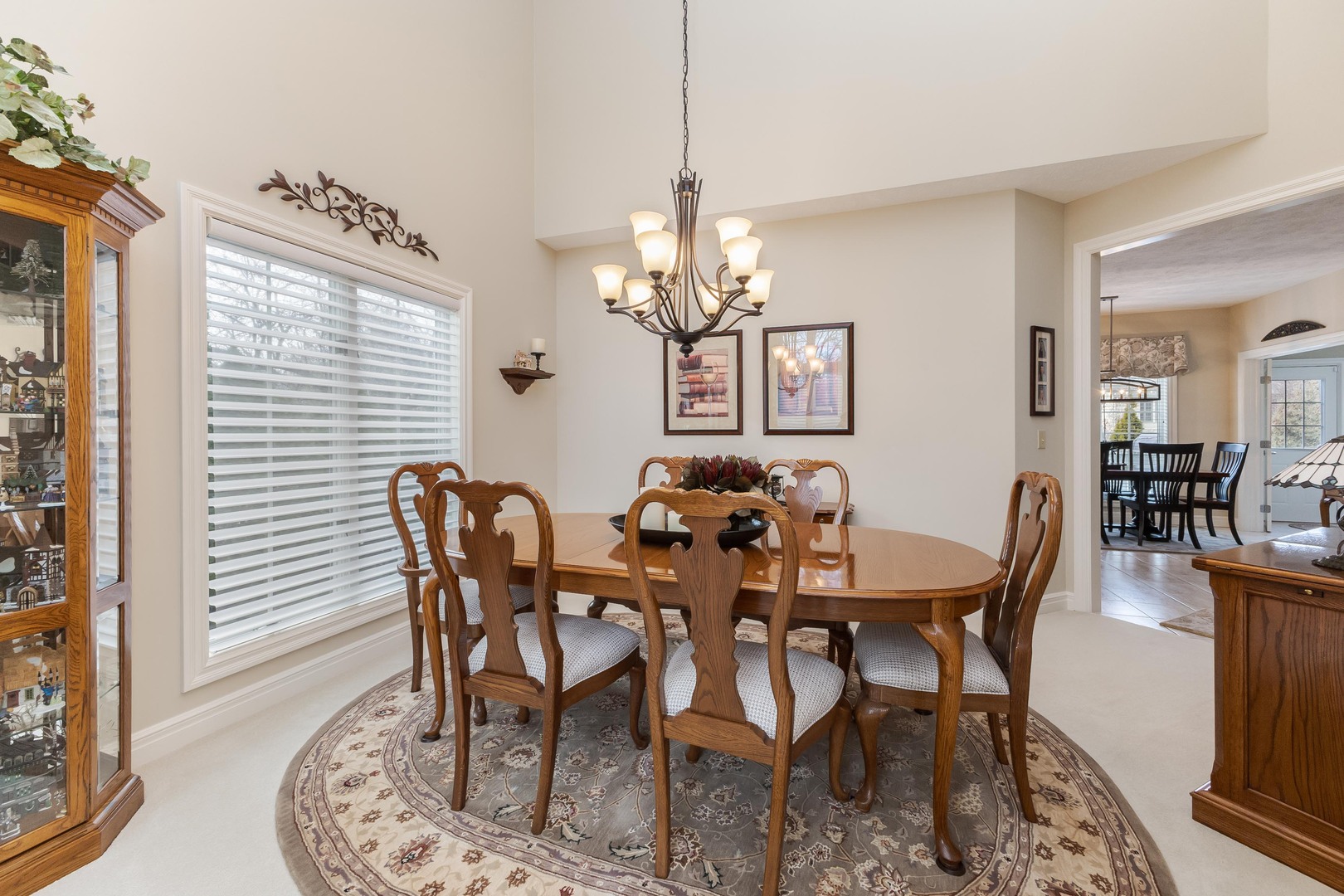 2006 Woodbine Road Bloomington, IL 61704 - Photo 28 of 98 a view of a dining room with furniture and wooden floor