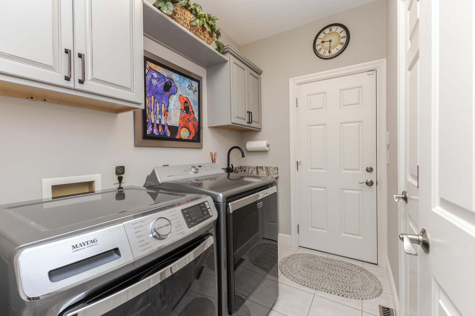 2006 Woodbine Road Bloomington, IL 61704 - Photo 30 of 98 a view of a kitchen with a stove and a refrigerator