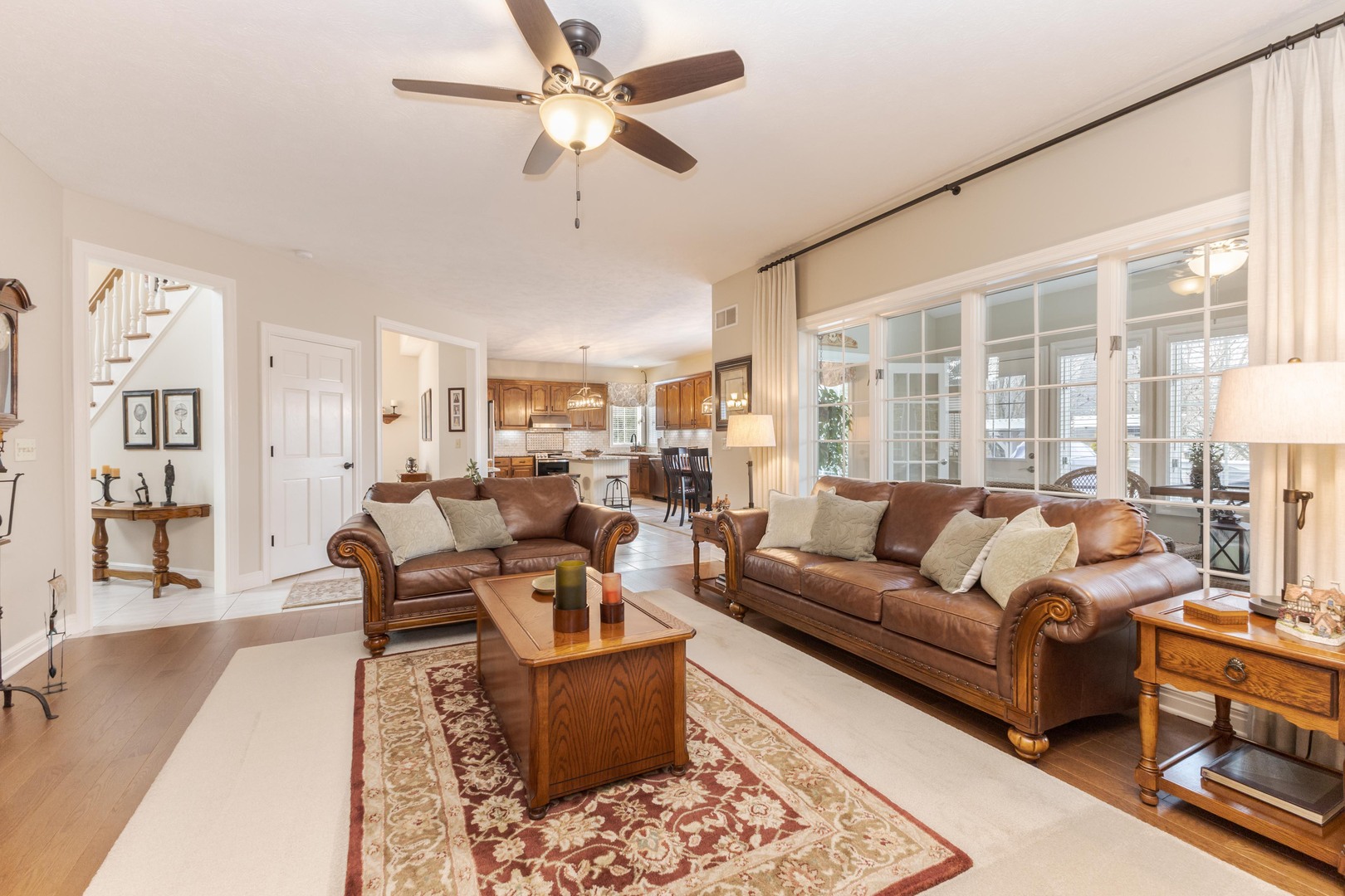 2006 Woodbine Road Bloomington, IL 61704 - Photo 34 of 98 a living room with furniture or couches and a large window