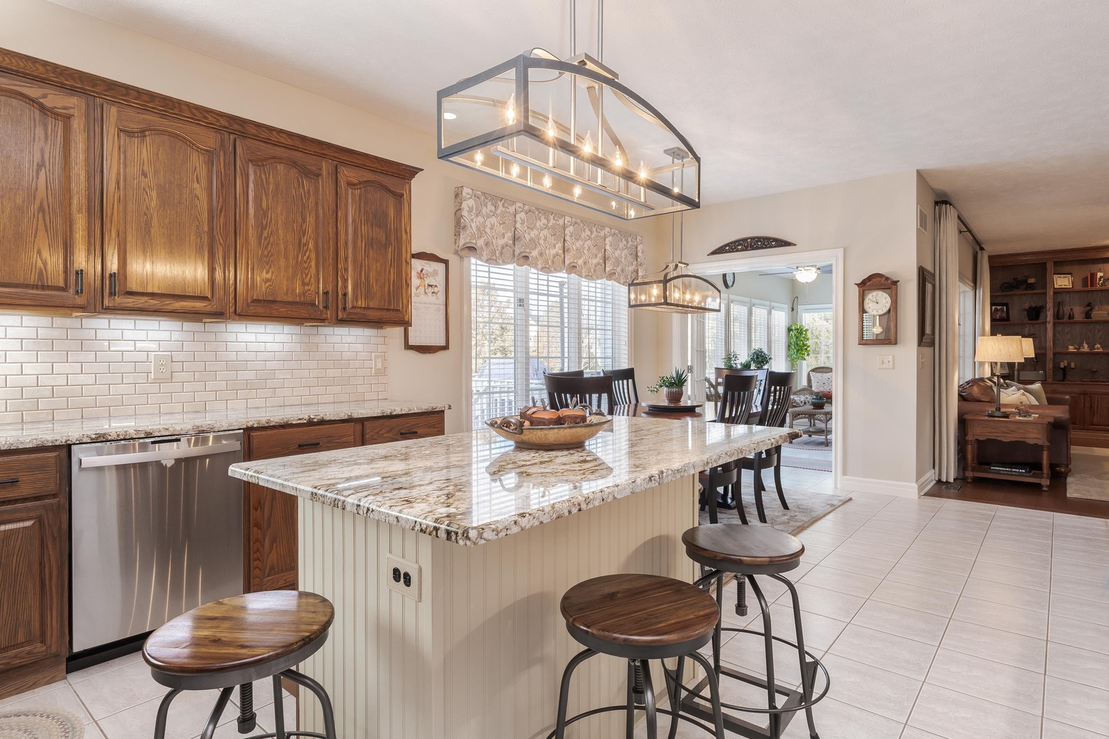 2006 Woodbine Road Bloomington, IL 61704 - Photo 38 of 98 a kitchen with a dining table and chairs