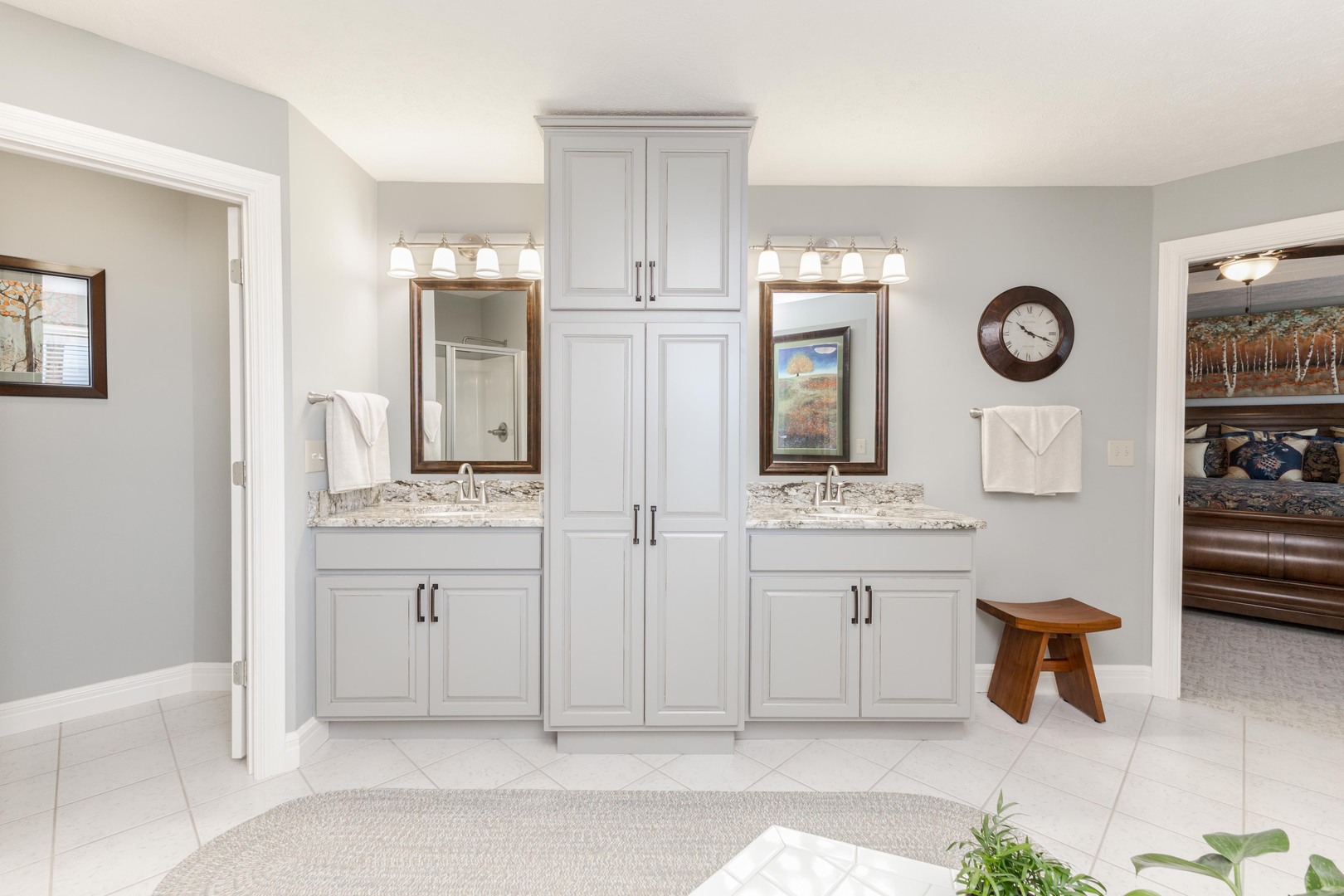 2006 Woodbine Road Bloomington, IL 61704 - Photo 54 of 98 a bathroom with a sink a toilet and a mirror