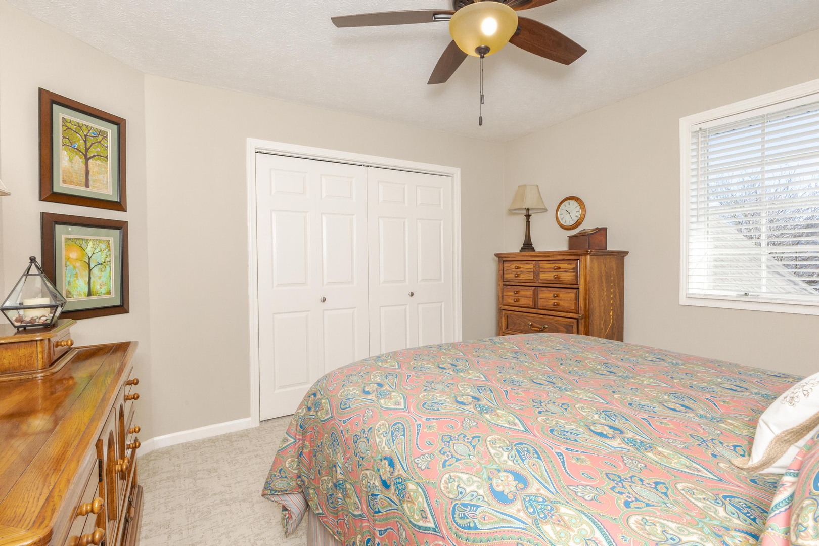 2006 Woodbine Road Bloomington, IL 61704 - Photo 58 of 98 a bedroom with a bed and a chandelier