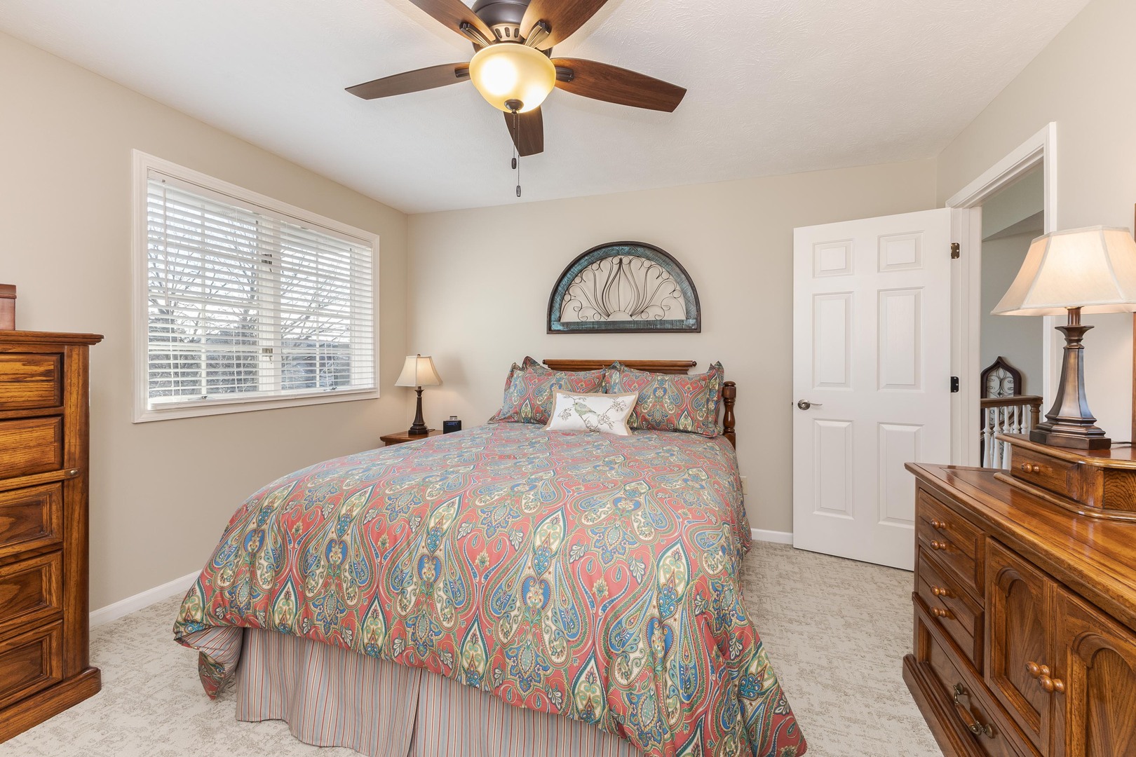 2006 Woodbine Road Bloomington, IL 61704 - Photo 59 of 98 a bedroom with a bed and a flat screen tv