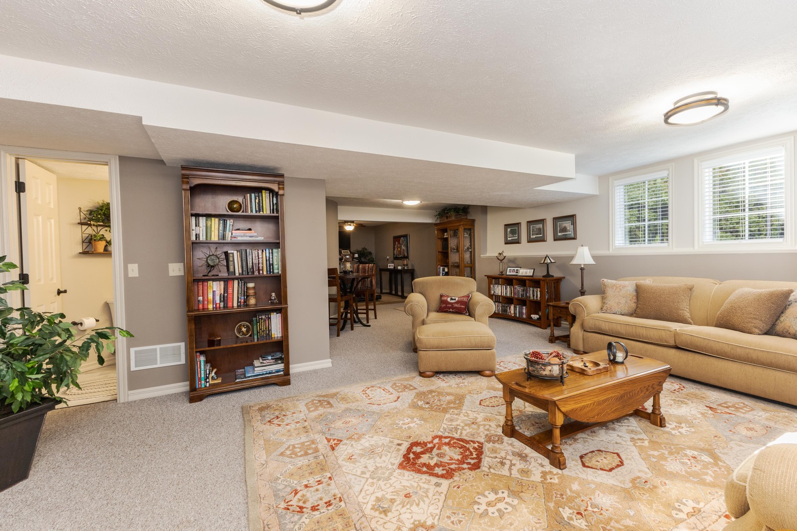 2006 Woodbine Road Bloomington, IL 61704 - Photo 74 of 98 a living room with furniture and a couch