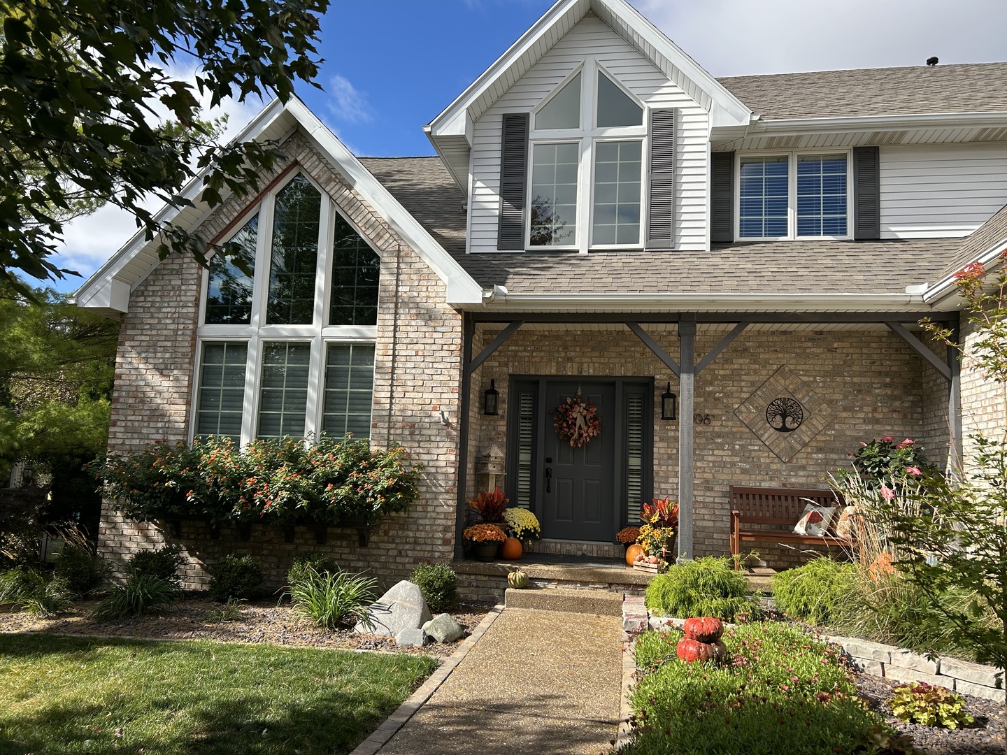 2006 Woodbine Road Bloomington, IL 61704 - Photo 8 of 98 front view of a house with a yard