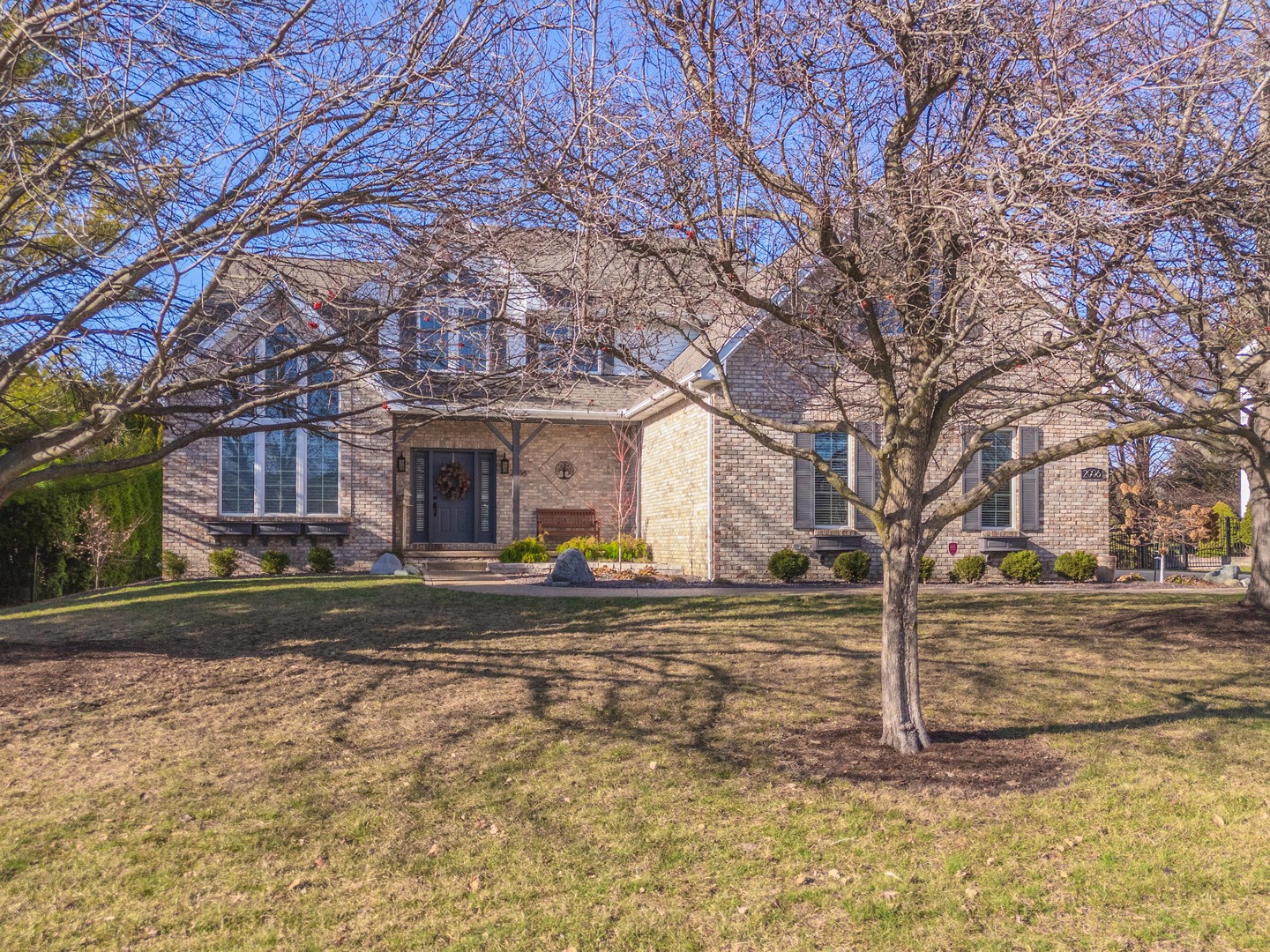 2006 Woodbine Road Bloomington, IL 61704 - Photo 86 of 98 a front view of a house with a yard