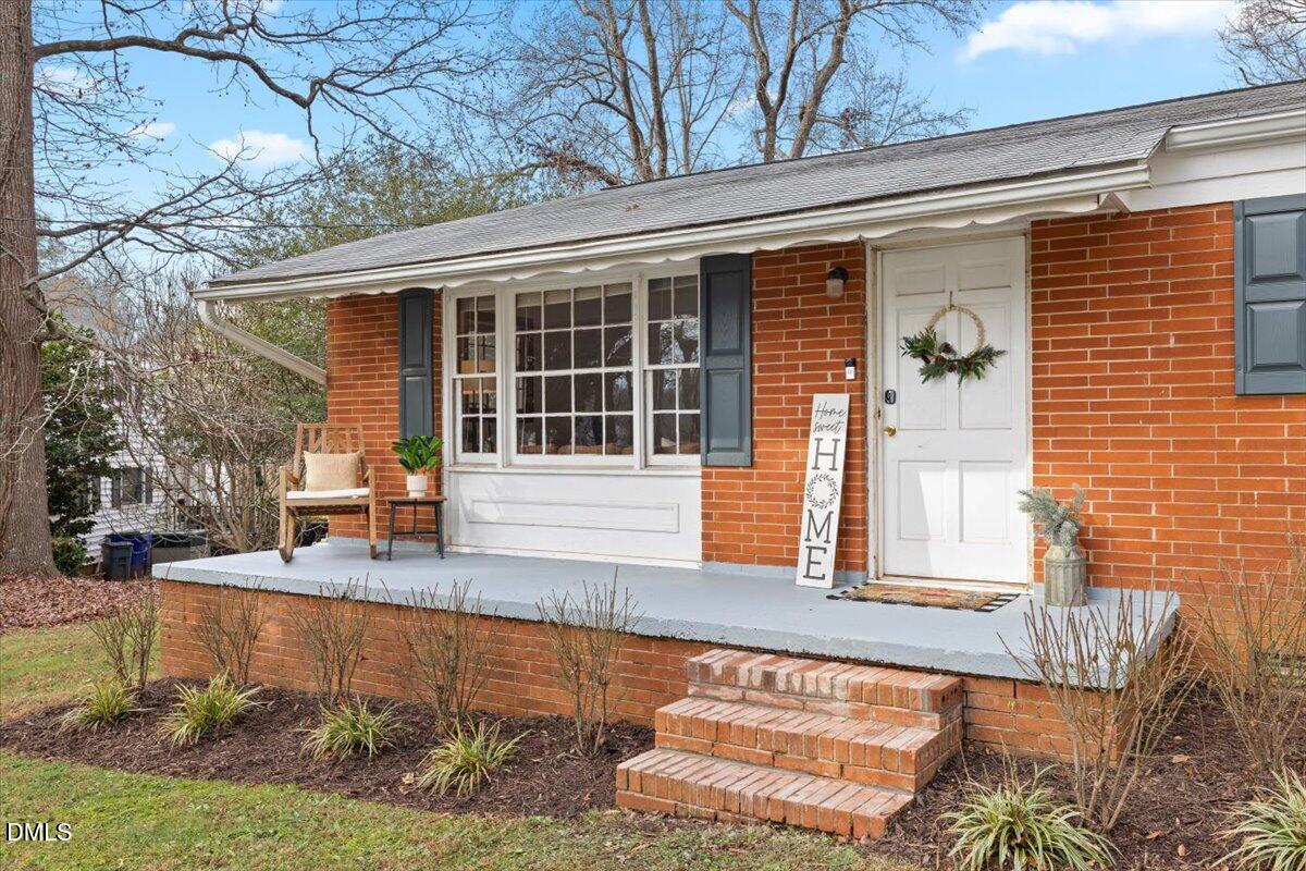 1719 Lawrence Road Hillsborough, NC 27278 - Photo 3 of 24 a front view of a house with swimming pool