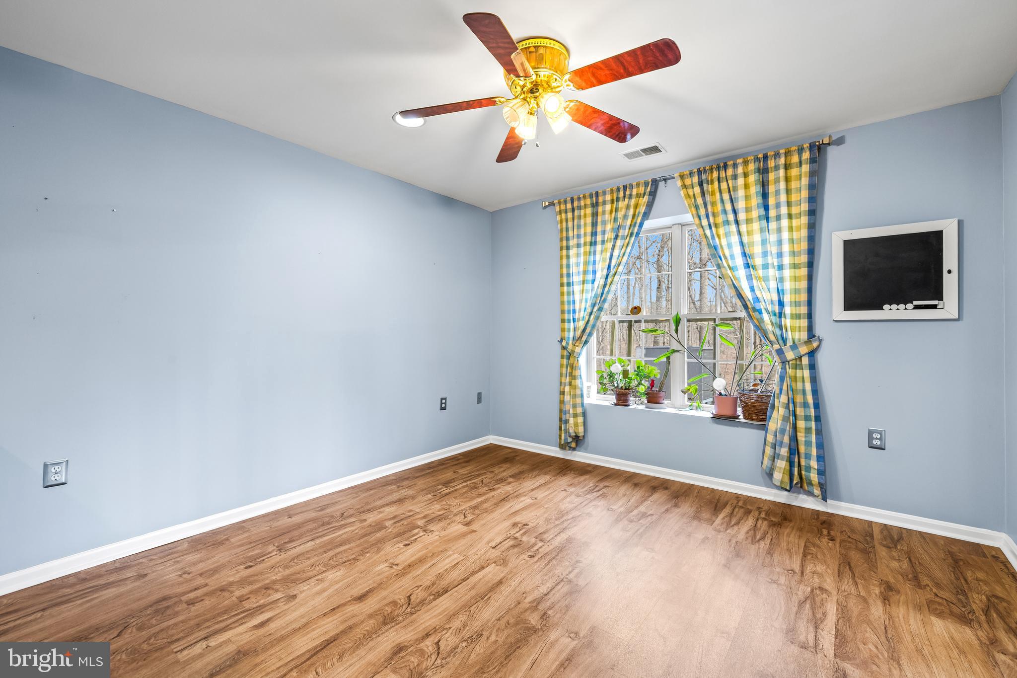 12011 Tralee Road, Unit 104 Lutherville-Timonium, MD 21093 - Photo 12 of 33 a view of livingroom with window