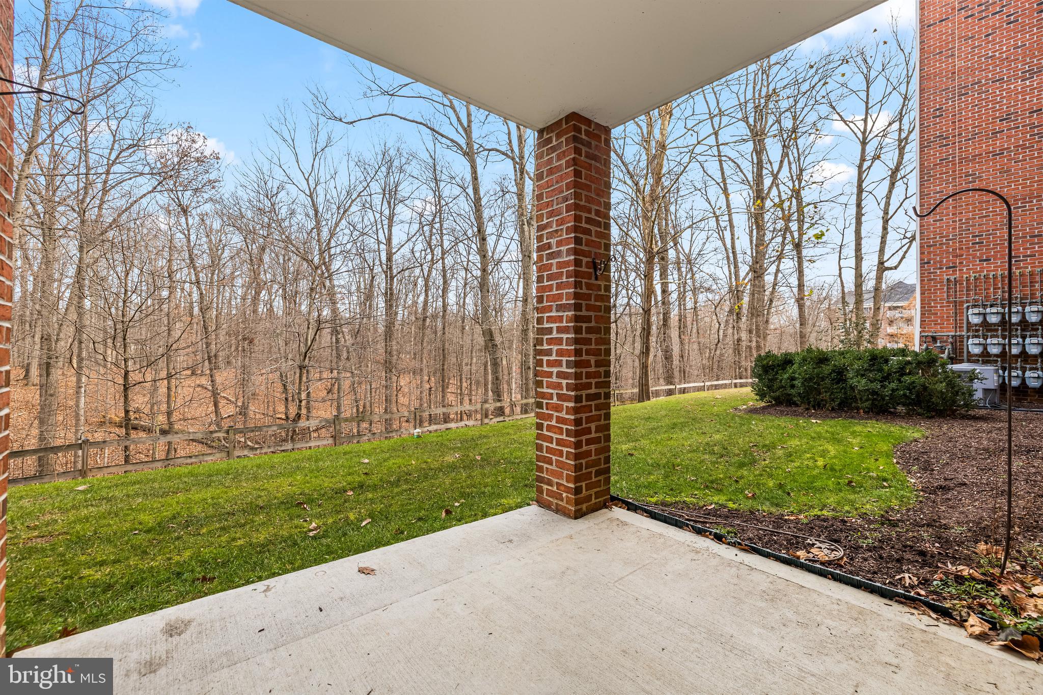 12011 Tralee Road, Unit 104 Lutherville-Timonium, MD 21093 - Photo 27 of 33 a view of a back yard with potted plants