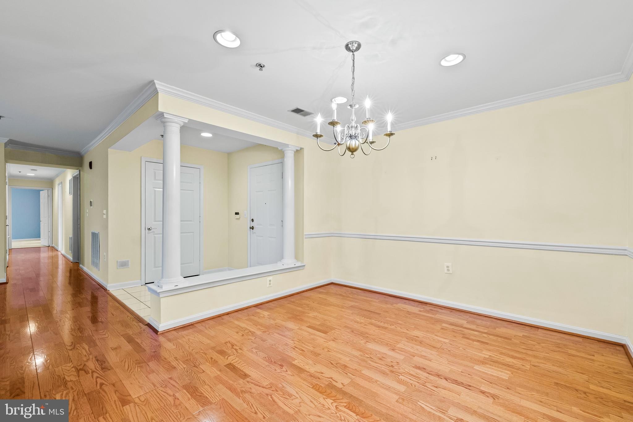 12011 Tralee Road, Unit 104 Lutherville-Timonium, MD 21093 - Photo 8 of 33 a view of a room with wooden floor