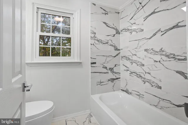 a bathroom with a sink and a bathtub