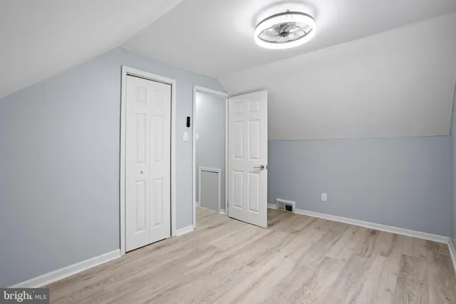 a view of a livingroom with wooden floor