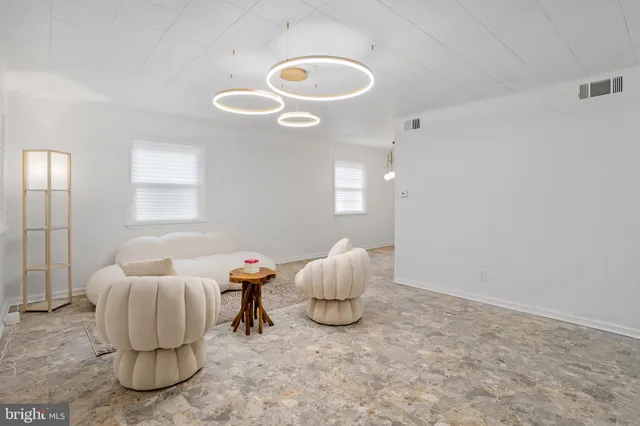 a room with cabinets and a window