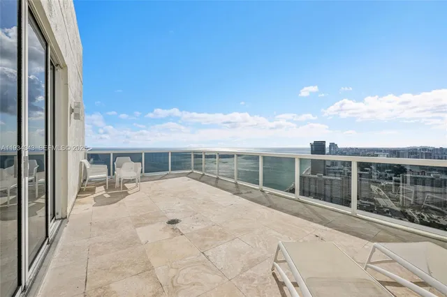 a view of a lake with a terrace