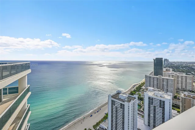 a bathroom with a double vanity sink mirror and bathtub