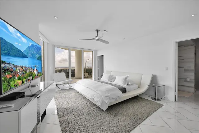 a view of a balcony with furniture