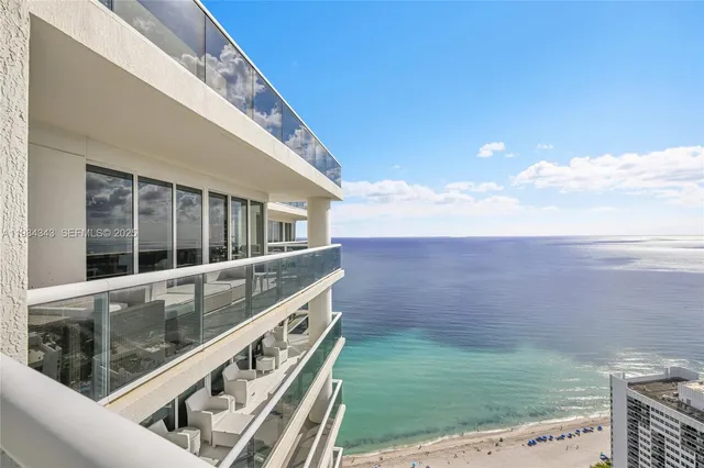 a patio with a table and chairs