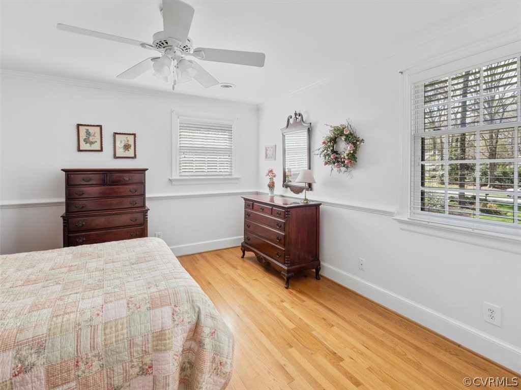 2931 West Brigstock Road Midlothian, VA 23113 - Photo 18 of 46 a bedroom with a bed and a window