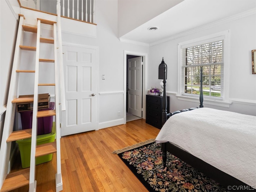2931 West Brigstock Road Midlothian, VA 23113 - Photo 23 of 46 a bed room with a bed and a window