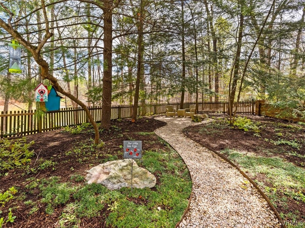 2931 West Brigstock Road Midlothian, VA 23113 - Photo 42 of 46 a view of a backyard with pathway