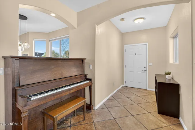 a view of room with window and hallway